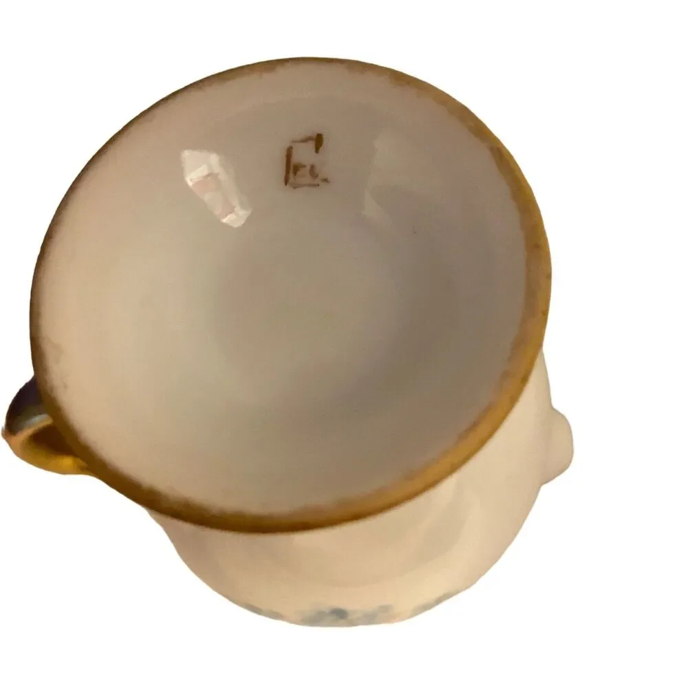 #8191 VINTAGE MADE IN JAPAN SUGAR BOWL AND CREAMER WITH LIGHT BLUE FLOWERS